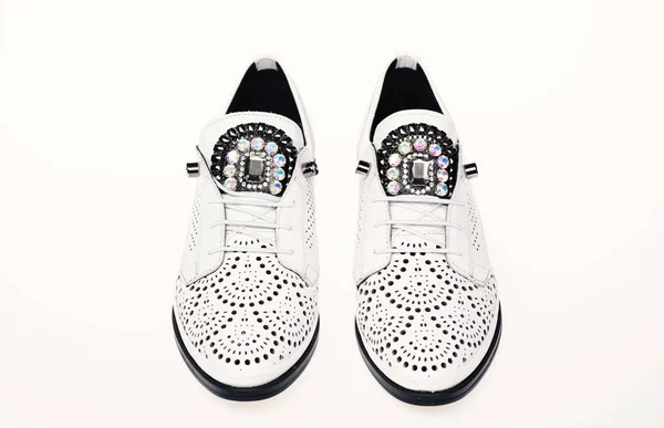 Comfortable modern lightweight oxford shoes on white background , isolated. Pair of comfortable oxfords shoes. Female footwear concept. Footwear for women on flat sole with perforation and rhinestone — Stock Photo, Image