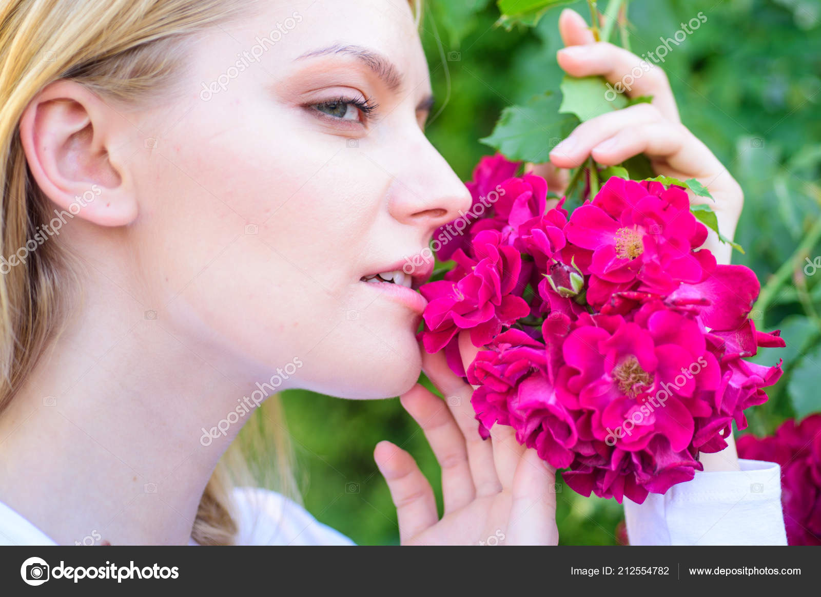 Rose extract oil aroma Girl and flowers on nature