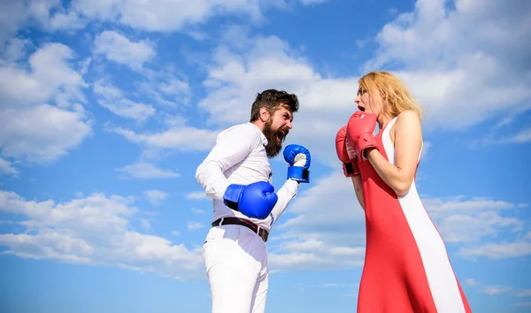 Be ready defend your point view. Man and woman fight boxing gloves blue sky background. Defend your opinion in confrontation. Couple in love fighting. Relations and family life as everyday struggle — Stock Photo, Image