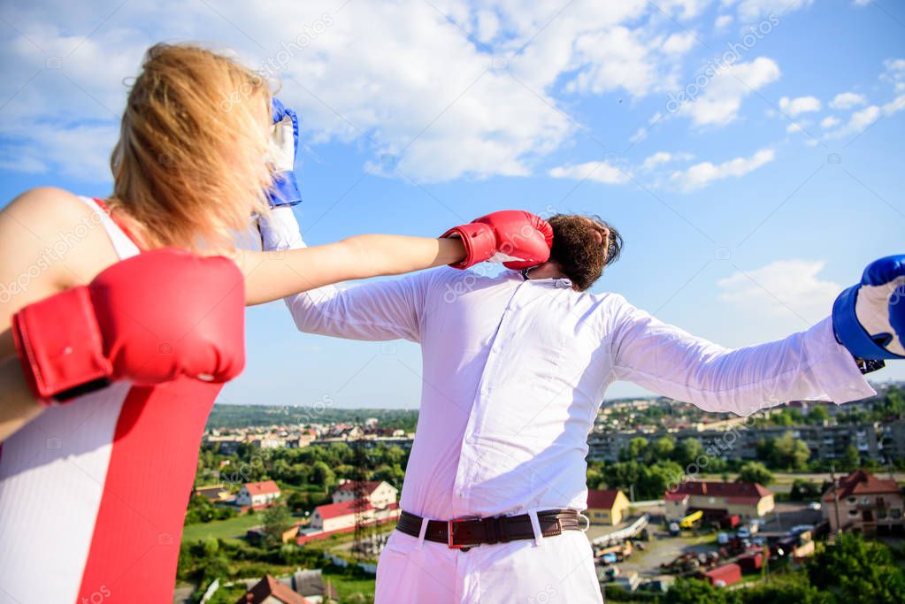 Couple boxing gloves fight sky background. Leadership family relations. Things guy can do to make woman happy. How to win her back effective tips. Girl confident strength power. Let her win concept