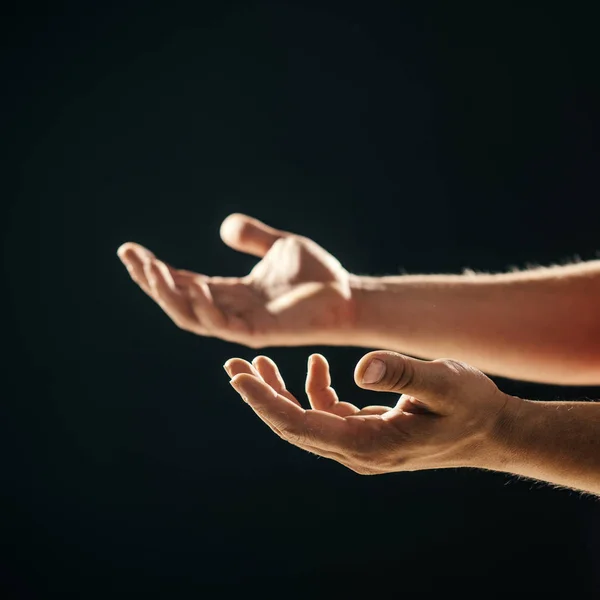 Gentle hands for cooperation or help. Fathers hands ready to help and support. Human requesting and supplicationing. Parents hands isolated on black background. Open palm, trust, friendship concept — Stock Photo, Image