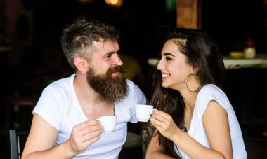 Couple in love drink black espresso coffee in cafe. Couple enjoy hot espresso. Romantic date in cafe. Drinking black coffee improves your mood and thus makes you happy. Pleasant coffee break clipart