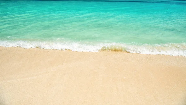 Wavy water background on sand — Stock Photo, Image