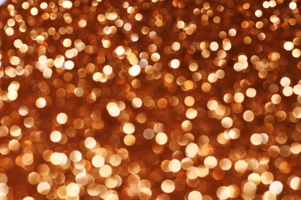 Orangeffekt durch Bokeh Licht abstrakten Hintergrund, Kopierraum. — Stockfoto