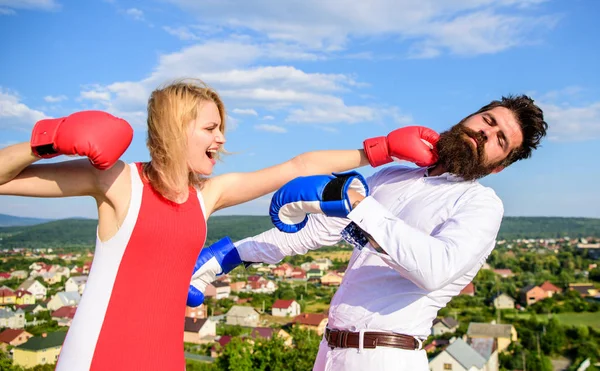 Signs you are henpecked husband. Couple boxing gloves fight sky background. Henpecked guy attacked by wife. Girl confident strength power. Gender domination concept. Leadership family relations — Stock Photo, Image