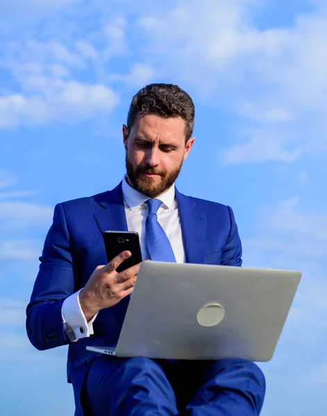 Sales manager responsibilities. Businessman surfing internet while call to client. Ultimate guide to becoming sales leader. Stay in touch. Man formal suit work with laptop while speak on phone
