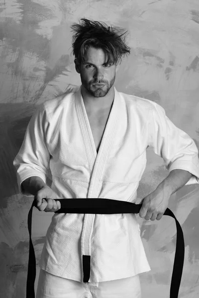 Karate fighter with fit strong body gets ready to fight. — Stock Photo, Image