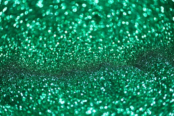 Paillettes vertes faites par effet bokeh fond abstrait, espace de copie . — Photo