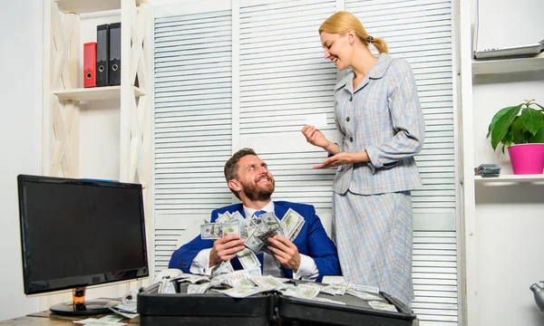 Businessman with cash client of bank. Office manager administrator holds bank card. Man business owner sit office pile of money. Bank assistant lady offers plastic card. Credit loan and cash concept