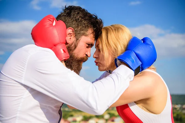 Man and girl cuddle happy after fight. Couple in love boxing gloves hug sky background. Quarrel and put up concept. Family life happiness. Reconciliation and compromise. Fight for your happiness — Stock Photo, Image