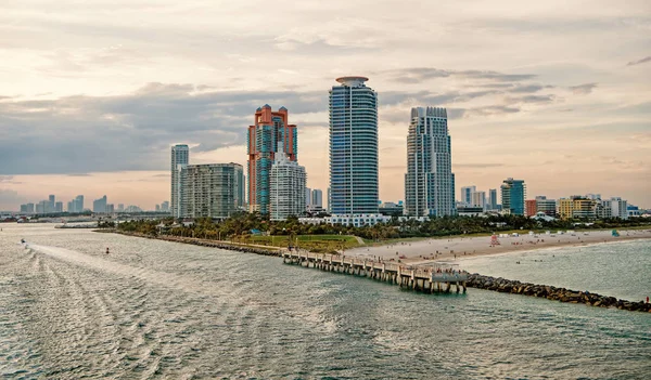 Miami skyscrapers with blue cloudy sky, boat sail, Aerial view — Stock Photo, Image