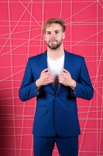 Man formal clothing looks handsome and confident. Proper outfit influence reputation in society. Man or businessman wear classic dark blue suit. Menswear and stylish wardrobe concept. Male fashion — Stock Photo, Image