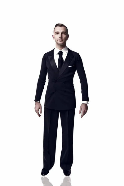 Confident attractive young man in tuxedo — Stock Photo, Image