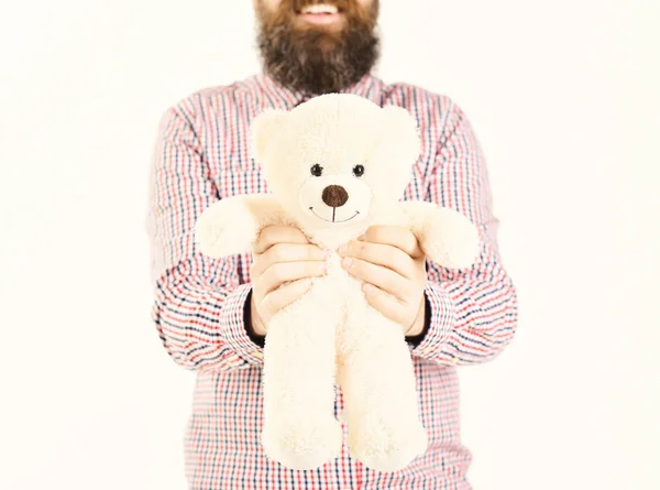 Hipster gives teddy bear as romantic gift or present — Stock Photo, Image