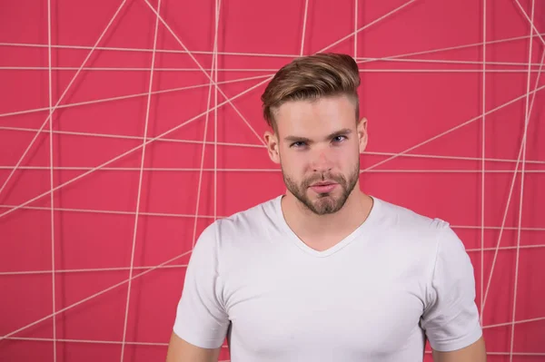 Simple hacks to make hairstyle better. Use right product styling hair. Confident with tidy hairstyle. Barber hairstyle tips. Man bearded guy modern hairstyle in pensive mood pink background