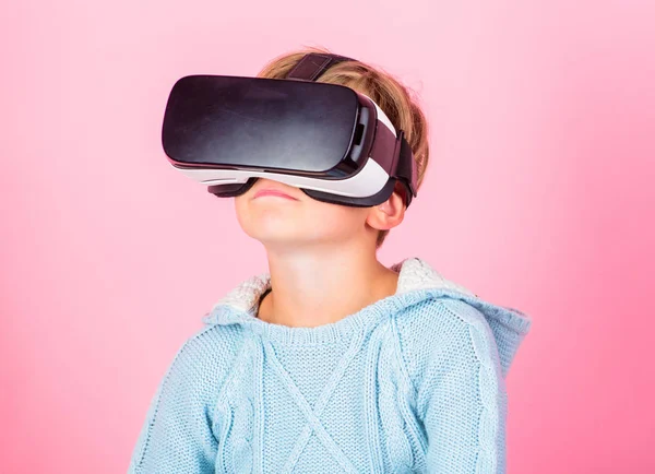 Discover virtual reality. Kid boy wear vr glasses pink background. Child boy play virtual reality game. Explore alternative reality. Cyber space and virtual gaming. Virtual reality future technology