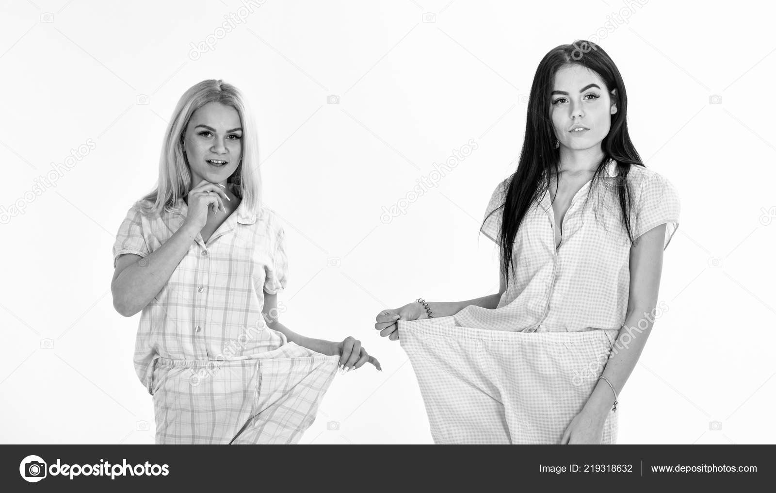 Sporty Women Showing Big Pants of Pajama. Sisters Lost Weight Together  Stock Photo - Image of showing, size: 142416040