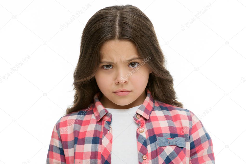 Little girl raise eyebrow isolated on white. Confident child with long brunette hair. Are you serious. Stop kidding me. Glance full of suspect. Kid looks offended and frowning. Stop bullying concept