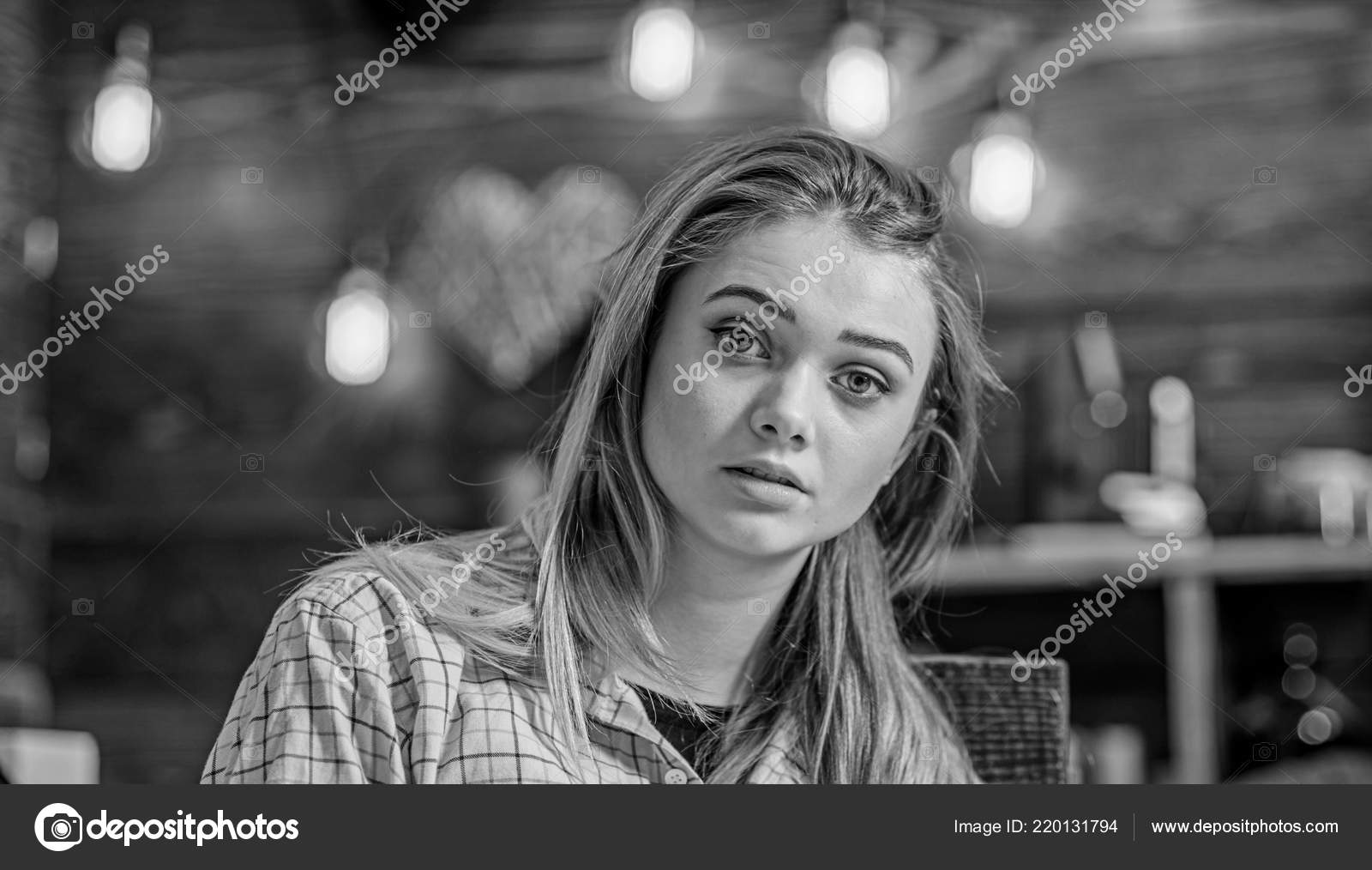 Blond girl with big green eyes, angel face and gorgeous hair posing  indoors. Teenage female with amused look wearing yellow boyish shirt, youth  fashion concept Stock Photo by ©stetsik 220131794