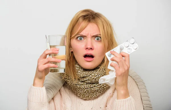 Woman wear warm scarf because illness or flu. Girl hold glass water tablets and thermometer light background close up. Getting fast relief. Ways to feel better fast. Flu home remedies. Get rid of flu — Stock Photo, Image
