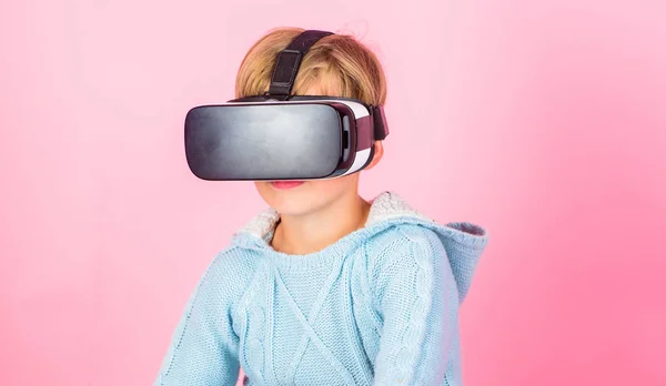 Virtual reality future technology. Discover virtual reality. Kid boy wear vr glasses pink background. Child boy play virtual reality game. Explore alternative reality. Cyber space and virtual gaming