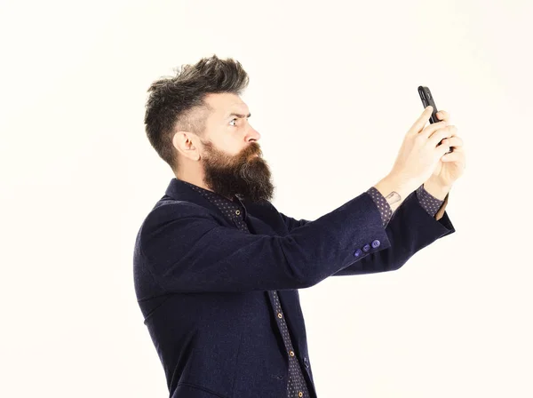 Hipster with long beard and serious face. — Stock Photo, Image