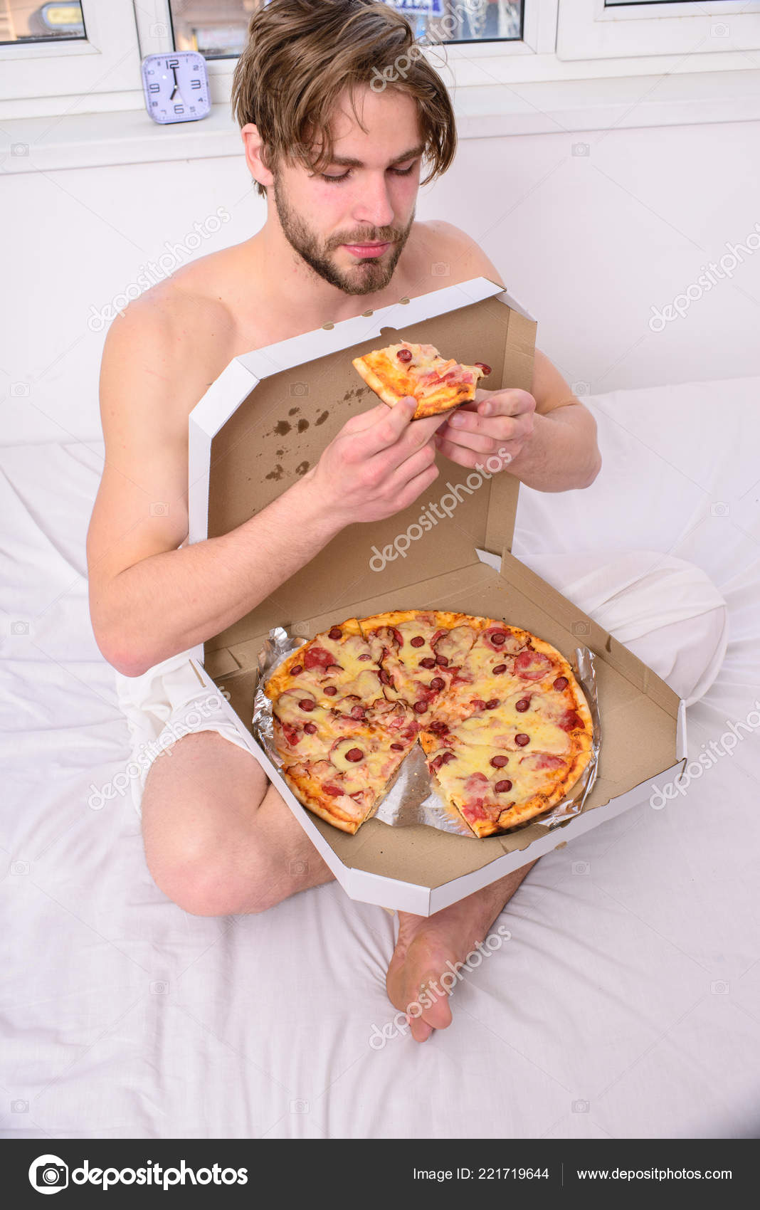 Guy naked covered pizza box sit bed bedroom offer you join him. Sexy  courier delivers gastronomic satisfaction. Gastronomic satisfaction. Man  bearded handsome eat pizza. Man eat pizza breakfast Stock Photo by ©stetsik