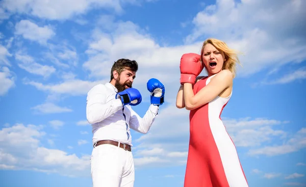 Be ready defend your point view. Man and woman fight boxing gloves blue sky background. Defend your opinion in confrontation. Relations and family life as everyday struggle. Couple in love fighting — Stock Photo, Image