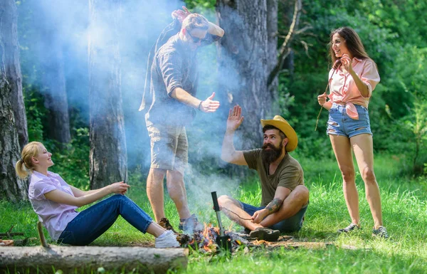 Join summer picnic. Company having fun while roasting sausages on sticks. Friends meeting near bonfire to hang out and prepare roasted sausages snacks nature background. Gathering for great picnic — Stock Photo, Image