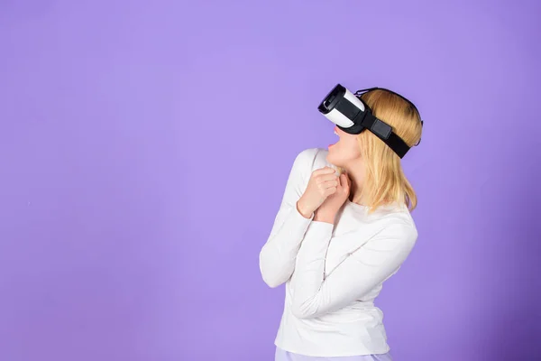 Virtual reality and future technologies. Girl use modern technology vr headset. Explore virtual reality. Digital device and modern opportunities. Woman head mounted display violet background