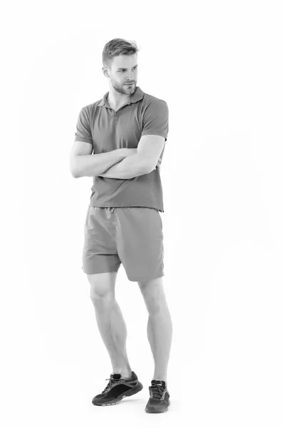 Deportista aislado en blanco. Hombre en desgaste activo y zapatillas de deporte de longitud completa. Entrenador personal para un estilo de vida saludable. Ajuste y confianza. Estilo de moda deportiva. Actividad de formación y entrenamiento —  Fotos de Stock