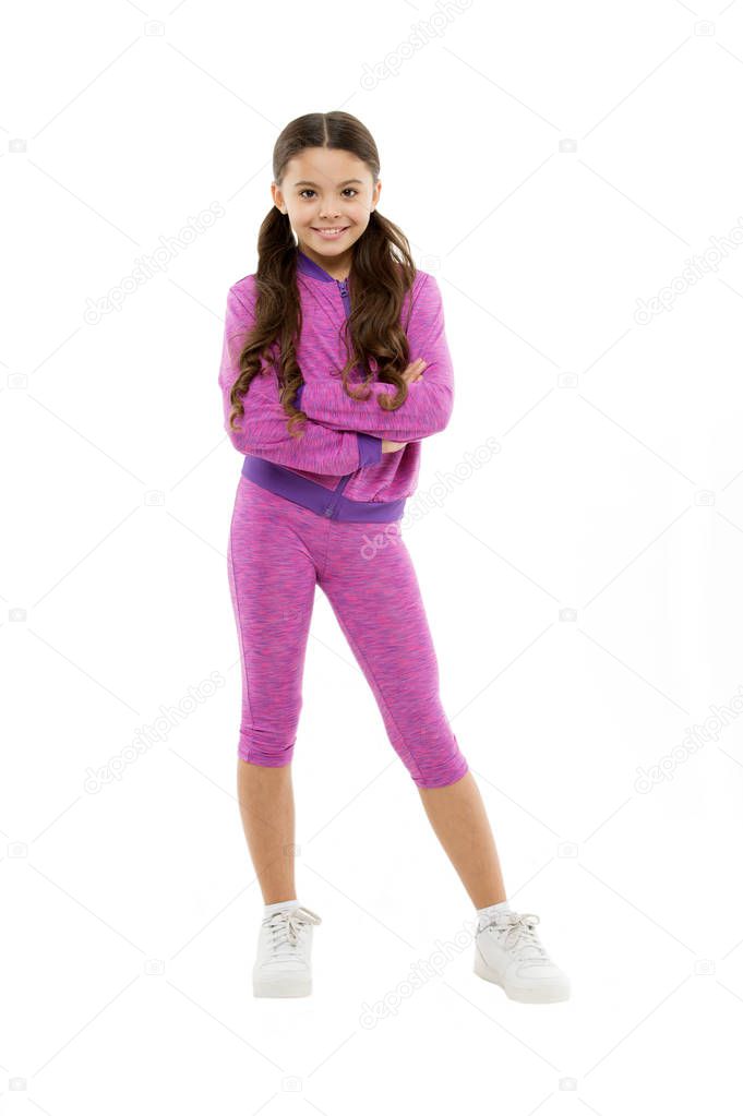 Girl cute kid with long ponytails wear sportive costume isolated on white. Sport for girls. Guidance on working out with long hair. Deal with long hair while exercising. Working out with long hair
