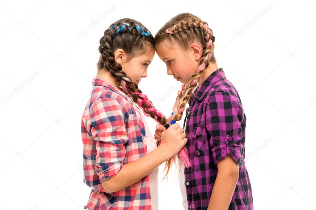 Girls friends similar hairstyle braids white background. Sisters family look. Kanekalon hairstyle. Long hair hairstyle. Keep hairstyle braided for healthier hair. Heart symbol made out of braids