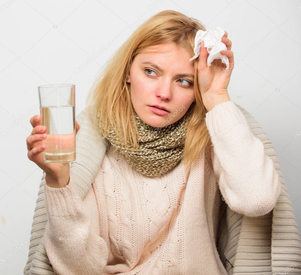 Girl take medicine drink water. Headache and cold remedies. Flu and cold concept. Woman tousled hair scarf hold tissue. Guidelines for treating cold. Take medications to get rid of cold