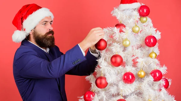 Christmas atmosphere spread around. Add magic to holidays. Man bearded wear formal suit and santa hat. Businessman join christmas celebration. Santa hold christmas ball decoration. Merry christmas — Stock Photo, Image