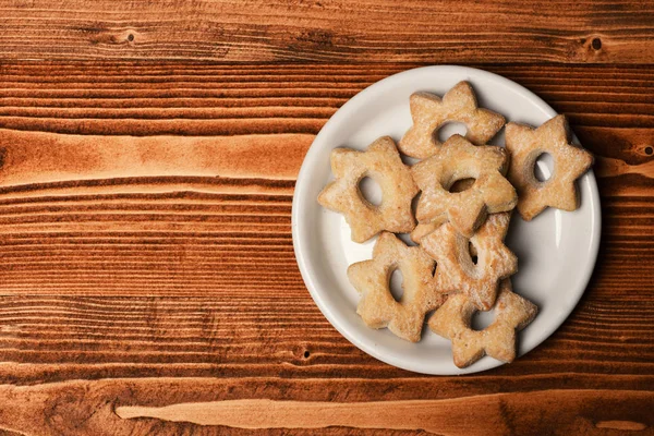 Conceito de pastelaria caseira. Biscoitos de chá no fundo de madeira — Fotografia de Stock