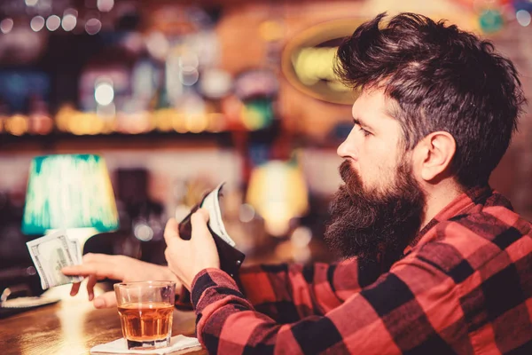 Depression and alcoholism concept. Guy spend leisure in bar,