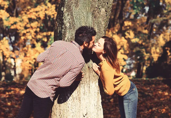 Man and woman with romantic faces on nature background — Stock Photo, Image