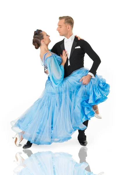 ballroom dance couple in a dance pose isolated on white background. ballroom sensual proffessional dancers dancing walz, tango, slowfox and quickstep. just dance ballroom couple