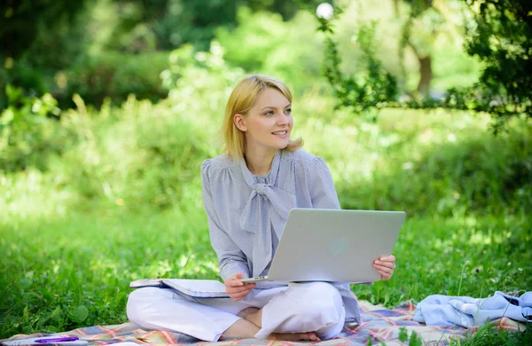 Business lady freelance work outdoors. Become successful freelancer. Woman with laptop sit on rug grass meadow. Online freelance career concept. Pleasant occupation. Guide starting freelance career