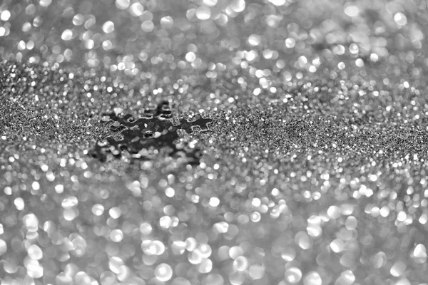 Silver glitter made by bokeh effect with silver snowflake abstract background, copy spac — Stock Photo, Image