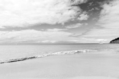 Pastoral sahne kum tropik sahil dalga mavi deniz. Herkes tropic resort st.johns antigua ziyaret etmeniz gerekir. Üst listesi tatil tatil. Tropic ada tatil seyahat. Çarpıcı güzellik tropic çevre