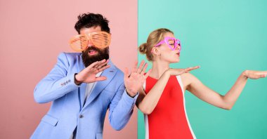 Frienship of happy man and woman. Hipster. Office party. Best friends. Couple in love. Relations. Summer vacation and fashion. Happy couple in party glasses. We are the winners. Party with friends. clipart