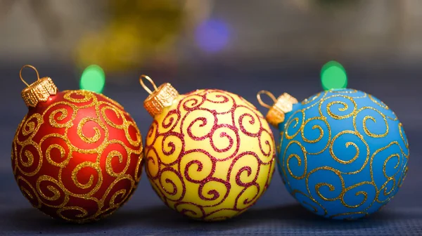 Christmas balls decoration on blue wooden surface. Winter holiday concept. Symbol of new year and christmas holidays. Various christmas decorations. Decorate christmas tree with traditional toys — Stock Photo, Image