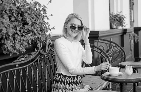 Great start of day. Mug of good coffee in morning gives me energy charge. Woman elegant happy face have coffee cafe terrace outdoors. Girl drink coffee every morning at same place as tradition