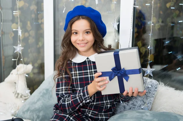 delivery christmas gifts. What a great surprise. happy little girl celebrate winter holiday. christmas time. happy new year. Cute little child girl with xmas present. By golly, be jolly