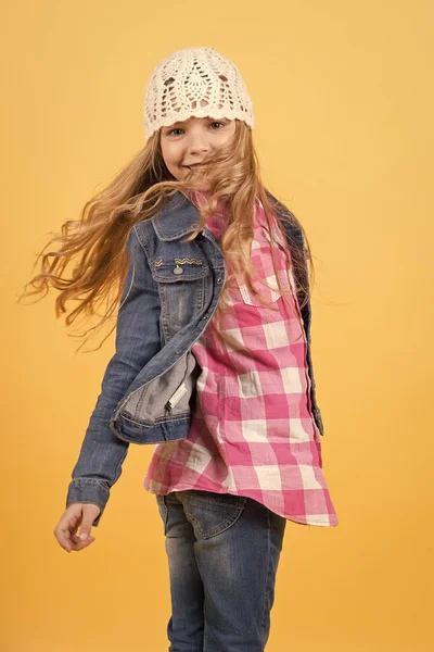 Child model smile with long blond hair