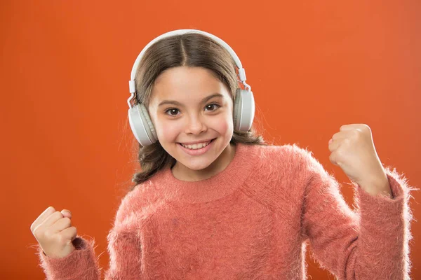 Keep hands free with wireless modern technology. Girl child listen music modern wireless headphones. Listen for free. Get music account subscription. Access to millions songs. Enjoy music concept — Stock Photo, Image