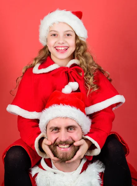 Happy childhood. Christmas family holiday. Father christmas concept. Make holiday extra special. Celebrate christmas together. Christmas family tradition. Dad in santa costume and daughter cute kid