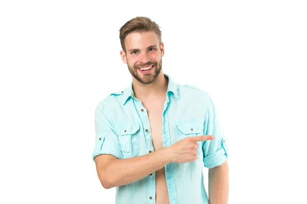 Look there. Man handsome bearded guy smiling on white background isolated. Guy cheerful smile macho pointing to side with finger. Positive emotions. Man with sincere smile. Good mood. Brilliant smile — Stock Photo, Image